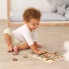 Eichhorn fogantyús puzzle - natúr háttérrel